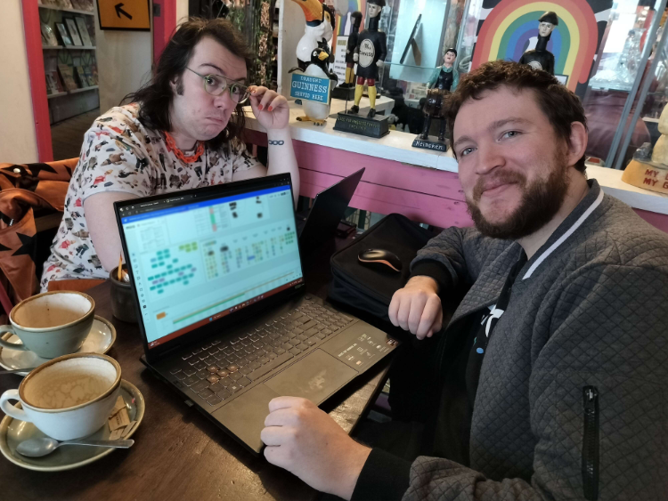 Stupes & Alex plotting games over coffee
